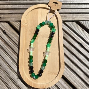 Green phone charm|Phone charm|Green phone charm|Charm|bright green |green beads|butteryfly beads|star beads|light green|green|black|