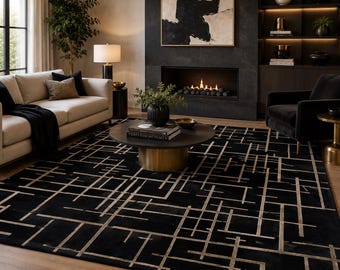 May include: A rectangular area rug featuring a black base with a geometric pattern of intersecting thin beige lines. The design consists of horizontal and vertical lines of varying lengths that create a grid-like structure across the entire surface.