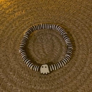 Clay bead bracelet with small ghost charm