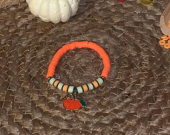 Clay bead bracelet with pumpkin charm