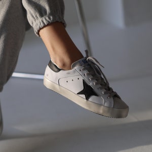 Golden Goose Classic Weiß-Schwarze Sneakers für Frauen Bild 1