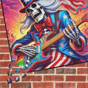May include: A skeleton dressed as Uncle Sam plays a guitar with a psychedelic background. The text "First Live April 10, 1974 U.S. Blues" is in the upper right corner.