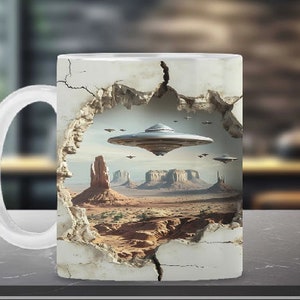 May include: A white ceramic mug with a 3D effect design. The mug features a cracked wall revealing a desert landscape with flying saucers in the sky.