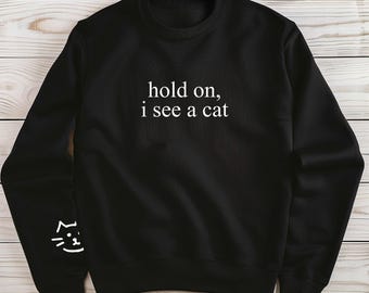 hold on, i see a cat Crewneck Sweatshirt | Cat Text Graphic