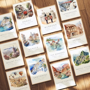 May include: A collection of watercolor paintings depicting famous landmarks around the world. Each painting features a unique location, including the Grand Canyon, Machu Picchu, Santorini, and Mount Fuji. The paintings are framed in a simple white frame and have a watercolor background.