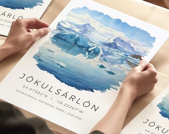 May include: A physical print featuring a watercolor painting of Jökulsárlón glacier lagoon in Iceland. The artwork showcases blue icebergs, mountains, and the text "JÖKULSÁRLÓN" with coordinates and location details. The words "PHYSICAL PRINT" are also visible.