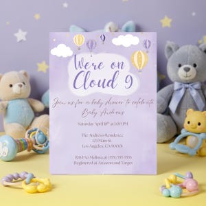 May include: A baby shower invitation with a lavender background and the text "We're on Cloud 9." The invitation features illustrations of hot air balloons and clouds. The details include the baby's name, date, time, location, and RSVP information.