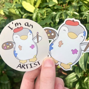 Cute artist penguin stickers: "I'm an artist". Kawaii vinyl sticker for creatives. Handmade animal sticker set