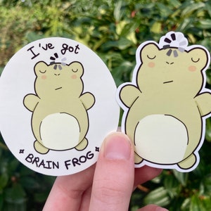 Lustiger Froschaufkleber mit „Gehirnfrosch“. Zuordenbarer Aufkleber für psychische Gesundheit. EDS, ADHS, Angstzustände, Depressionen, psychische Gesundheit, chronische Krankheiten.