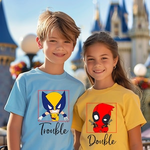 a couple of kids standing next to each other