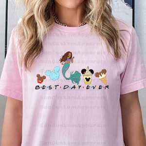 a woman wearing a pink t - shirt that says best day ever