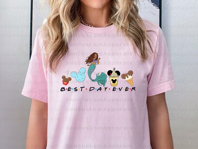 a woman wearing a pink t - shirt that says best day ever