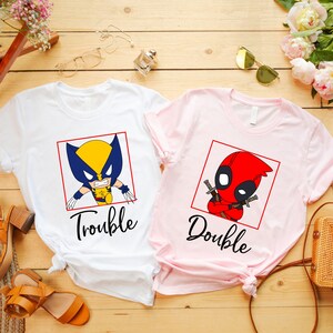 a couple of shirts that are on a table