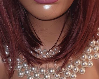 Gatsby. Roaring 1920s. Flapper Accessories. Statement headband. Long pearls. Vintage Themed Party. Evening. Long gloves. Cigarette holder