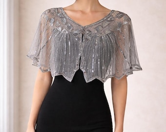 Chal estilo flapper de los años 20, capa Art Déco con lentejuelas en gris claro y gris oscuro.