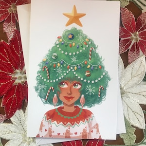 May include: A Christmas card featuring a woman with green hair styled like a Christmas tree. The tree is decorated with ornaments, lights, candy canes, and a star on top. She is wearing a red and white sweater with a gingerbread man pattern.