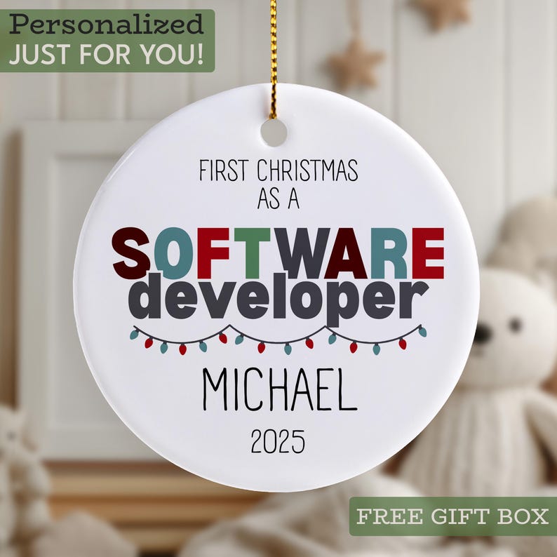 a personalized ornament with the text "First Christmas as a Software developer Michael 2025" and a free gift box.