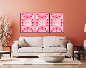 May include: Three pink framed prints with white lettering that reads "You Make Today Better" surrounded by red hearts and tulips. The prints are hanging on a peach wall above a white couch.