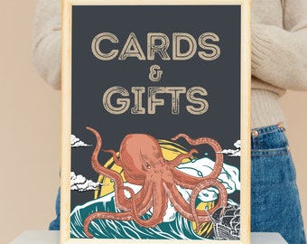 May include: A wooden sign with a black background and the text "CARDS & GIFTS" in brown lettering. An illustration of an octopus with a red body and white eyes is in the bottom half of the sign, with the octopus's tentacles reaching out of the water.