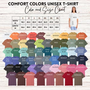 May include: A colour and size chart for Comfort Colors unisex t-shirts. The chart displays a variety of t-shirt colours, including white, melon, and terracotta. The size chart shows width and length measurements in inches for sizes S through 4XL.
