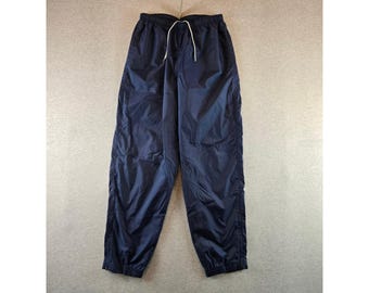 Pantalones deportivos cortavientos Nike para hombre, talla XL, color azul marino, estilo vintage, de nailon con cremallera en los puños.