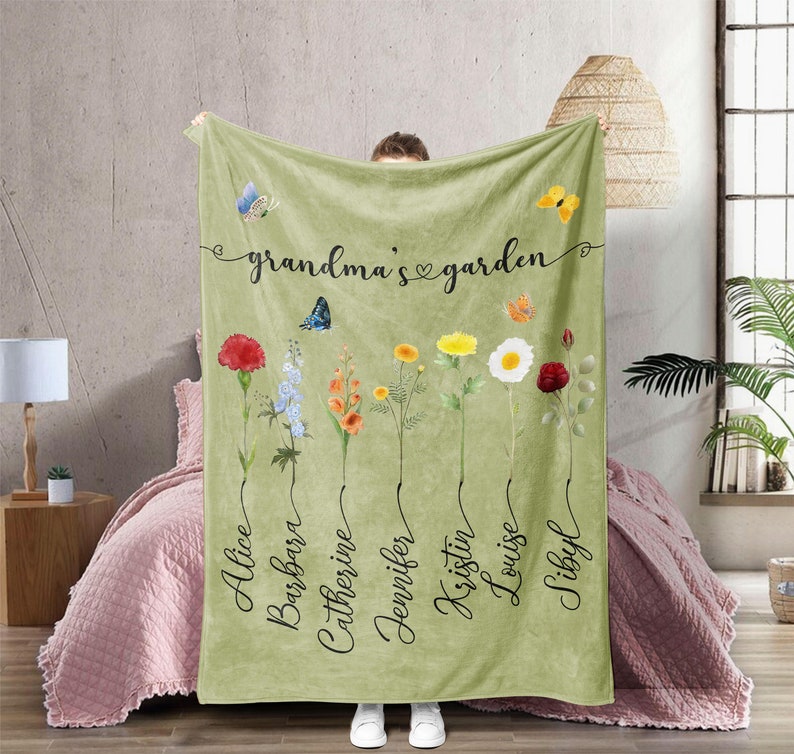 May include: A green fleece blanket with the text "grandma's garden" and a floral design with butterflies and names. The names are Alice, Barbara, Catherine, Jennifer, Kristin, Louise, and Sibyl.