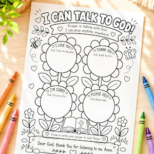 Puede incluir: Una hoja de actividades blanca con dibujos de líneas negras que presenta el texto I CAN TALK TO GOD! y cuatro contornos de flores grandes para escribir oraciones. La hoja incluye ilustraciones de una abeja, una mariposa y una Biblia abierta, con el texto Dear God, thank You for listening to me. Amen. en la parte inferior.