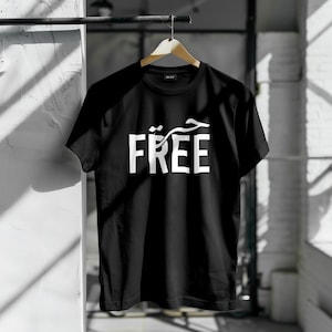 Palestine T-shirt with Arabic and English calligraphy, T-shirt that means freedom, Palestine T-shirt with a round neck, comfortable T-shirt.