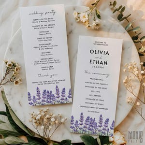 May include: Two wedding ceremony programs with lavender floral accents. The programs list the wedding party, ceremony details, and the names of the bride and groom, Olivia and Ethan, with the date 24.4.2026. The programs are on a marble surface with floral decorations.