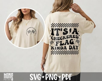 May include: A cream-coloured t-shirt featuring black graphics. The back displays the text IT'S A CHECKERED FLAG KINDA DAY with checkered patterns. The front chest area shows a smaller circular graphic with crossed checkered flags.
