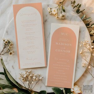May include: Two wedding programs with a peach and white color scheme. The programs feature an arched design at the top and include the text "Wedding party" and "Madison and Connor". The programs are surrounded by white flowers and greenery.