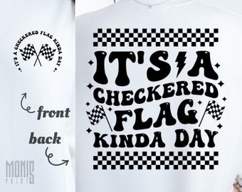 May include: White t-shirt with black text that reads "It's a checkered flag kinda day" with a checkered flag design above and below the text.