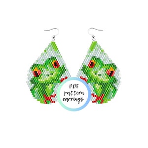 May include: A pair of beaded earrings featuring a green frog design with red and yellow accents. The earrings are teardrop-shaped and have a silver hook. The text "PDF pattern earrings" is in the center.
