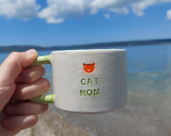 Handmade Ceramic Cat Mom Mug, Hand-Painted Cat Face, Green Handle Coffee Cup