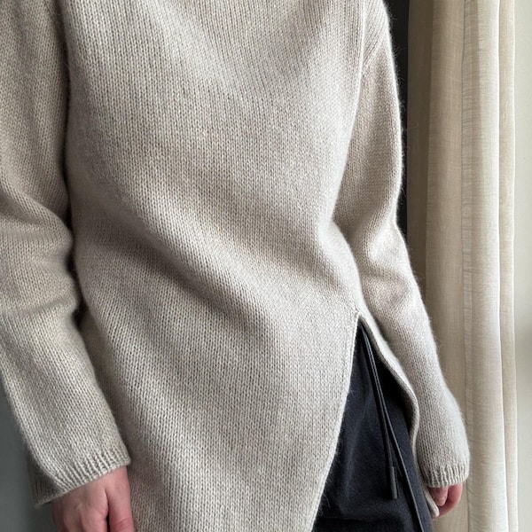 Liv Sweater Knitting Pattern: A modern, refined design for a turtleneck pullover with minimalistic top-down construction for women.
