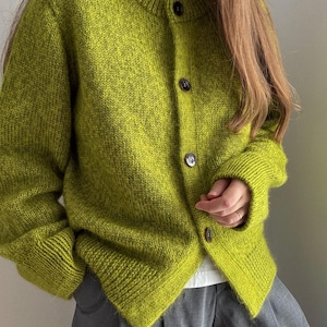 Crewneck o neck cardigan with drop shoulders and top down stockinette stitch in a modern, basic aesthetic.