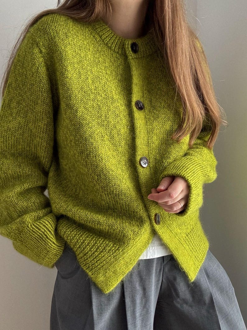 Crewneck o neck cardigan with drop shoulders and top down stockinette stitch in a modern, basic aesthetic.
