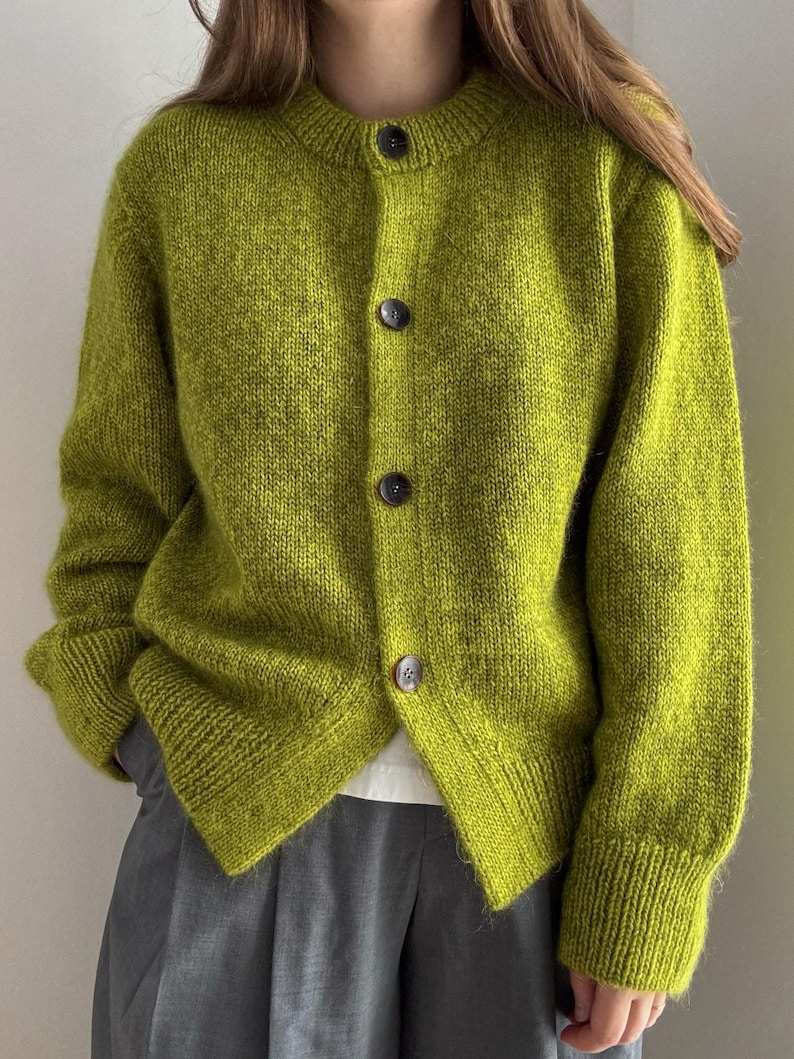 Janette Cardigan knitting pattern showing an oversized, slightly cropped button up cardigan by Moreca Knit.
