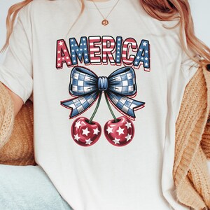 Camiseta de cerezas americanas, camiseta con lazo de cerezas americanas, camiseta del 4 de julio, regalo del Día de la Independencia, camiseta de Estados Unidos, camiseta con la bandera de EE. UU., camiseta patriótica de verano
