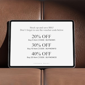 May include: A digital tablet displays text offering discounts: 20% off for buying 5 items, 30% off for 10 items, and 40% off for 20 items. The tablet is on a brown leather surface.