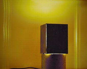 Single steel and concrete lamp