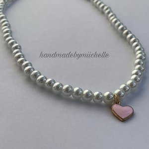 Pearl necklace with pink heart pendant image 1