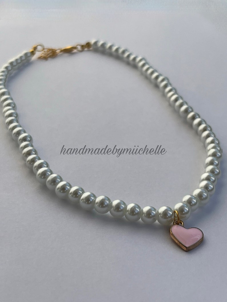 Pearl necklace with pink heart pendant image 1