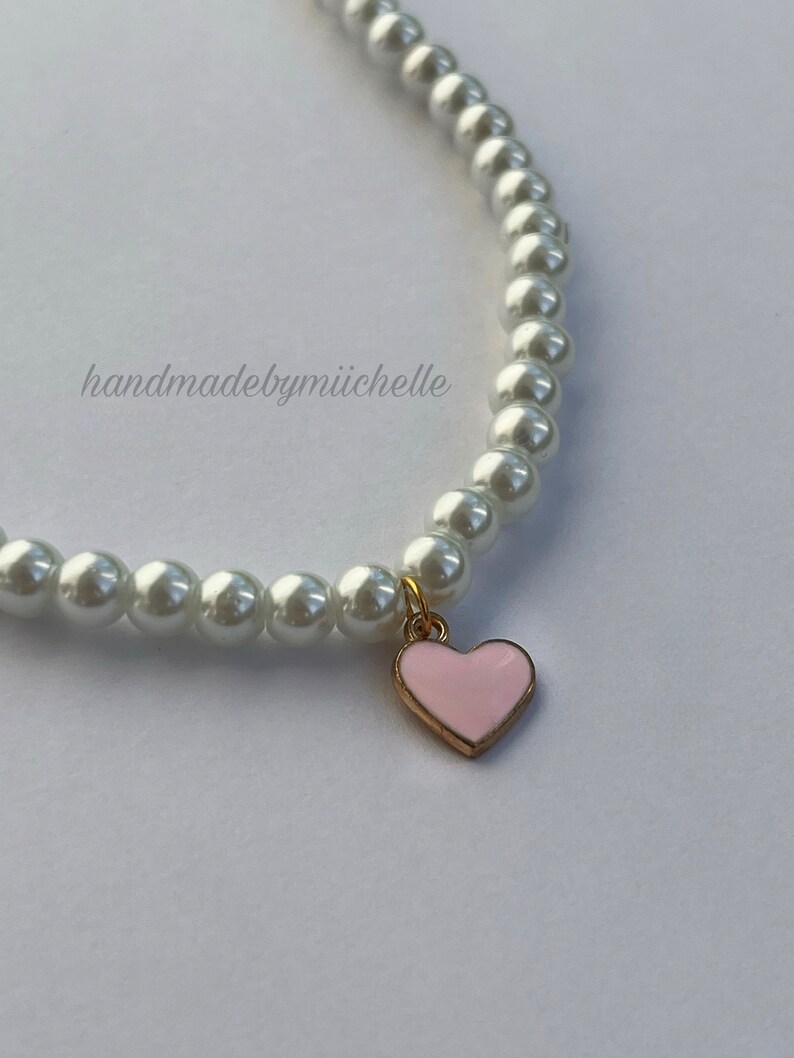 Pearl necklace with pink heart pendant image 2