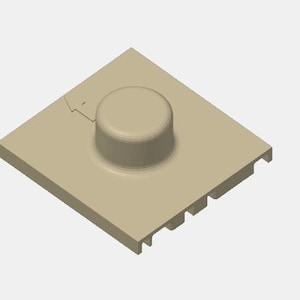 May include: A tan-colored, geometric object with a square base and a raised, circular element in the center. The base has a notched edge. The object appears to be a component or part of a larger structure.