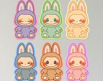 Pegatinas de vinilo resistentes al agua de monstruos peludos de Chibi