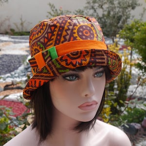 Bob hat, women&#39;s hat, cloche hat, summer hat, this bob hat is a variegated color dominated by orange Sophia 66