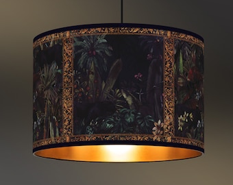 May include: A black and gold pendant light with a tropical print shade. The shade features a dark background with green and pink floral patterns and gold accents.