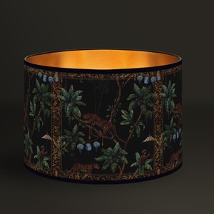 Vintage lampshade illustrated with a panther and a monkey in the jungle, for an exotic and captivating decoration. Golden Interior