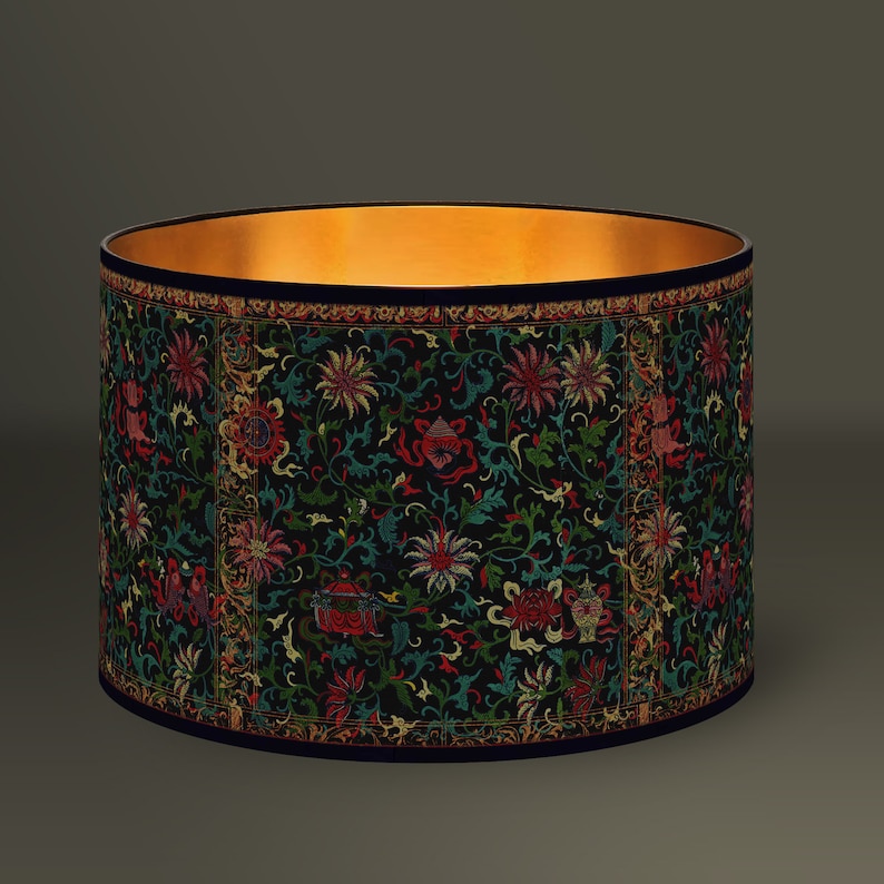 Rich lampshade with Renaissance floral patterned fabric and gold interior finish.